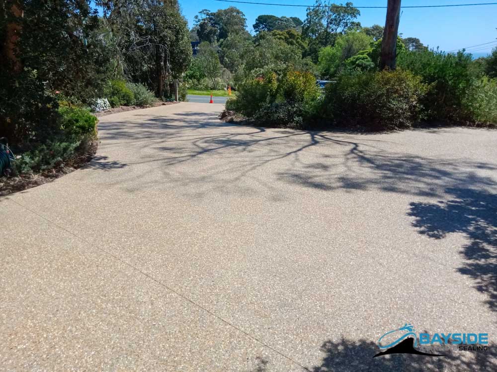 Sealed concrete driveway with clean protective finish