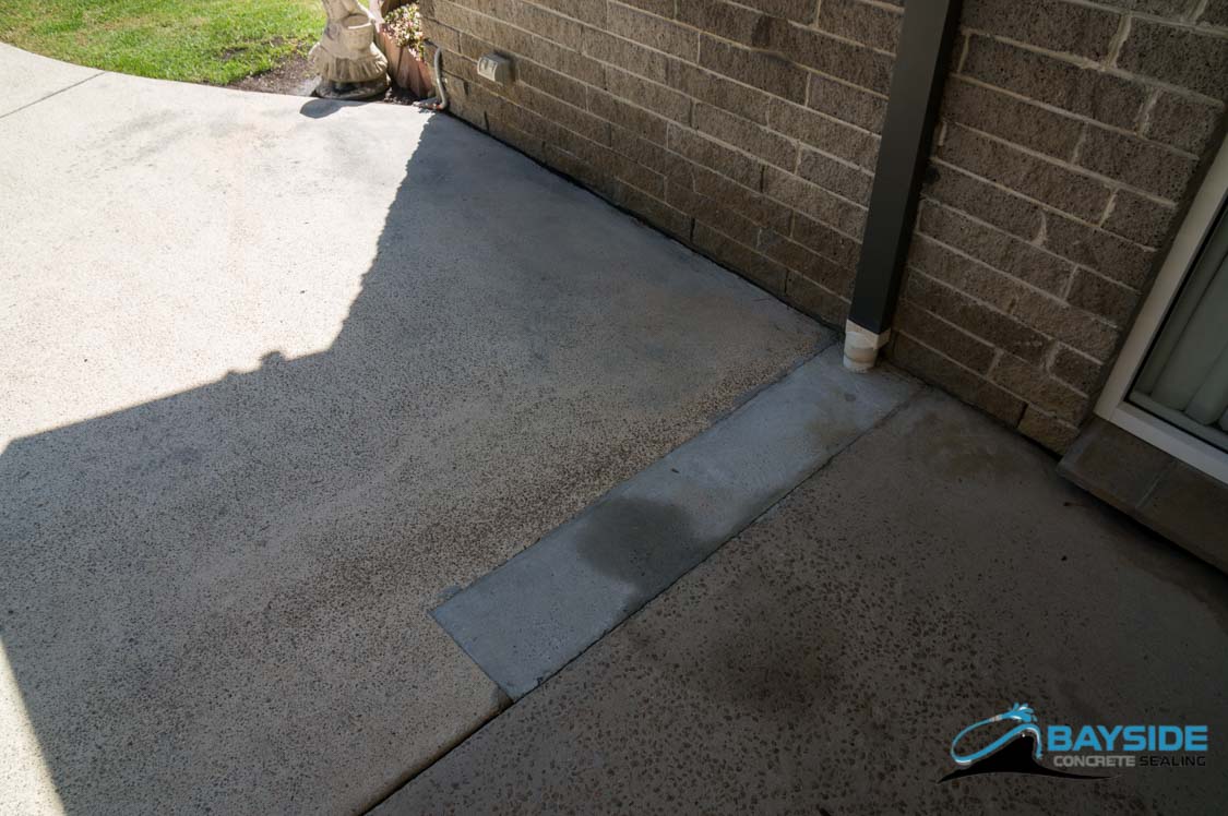 Finished restored exposed aggregate with enhanced natural stone tones