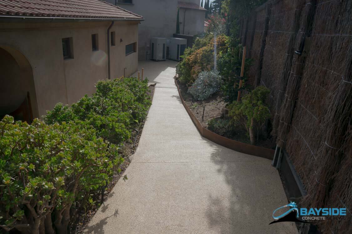 Completed colour enhancement with clear top coats on exposed aggregate