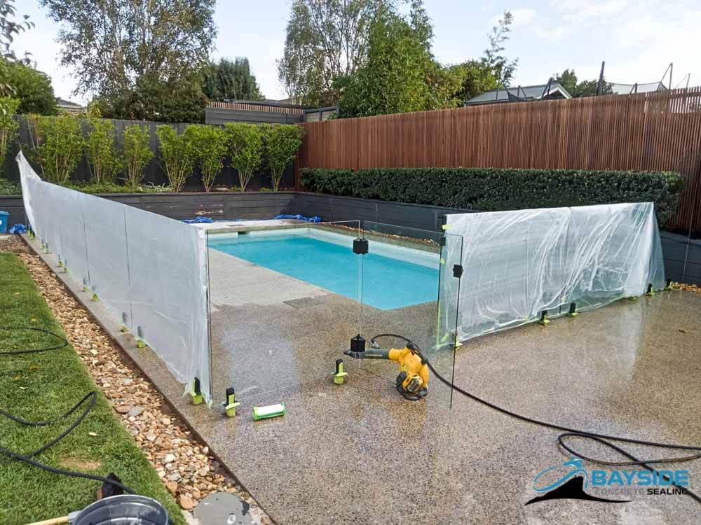 Rust staining treatment on coastal exposed aggregate concrete